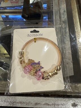 Gold Bracelet with Pink Crystal Charms